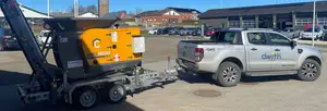 Rubblecrusher RC150V pulled by a car