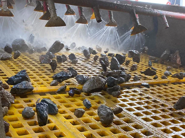 Washing rocks on screen