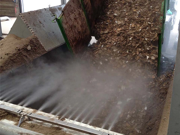Dust suppression in silo feeding area