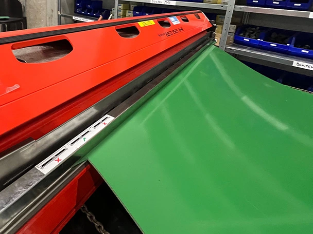 LP32-11 green PVC belt in a press