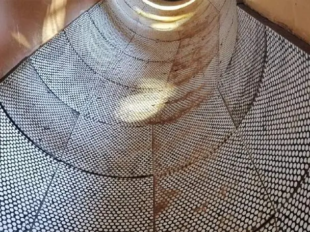 Ceramic lining of a vibrating drum