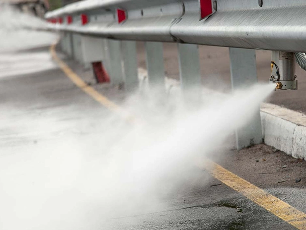 Spraying water on a quarry access road